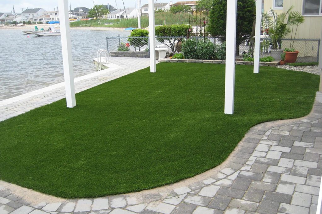 A lawn that has been installed by the water.