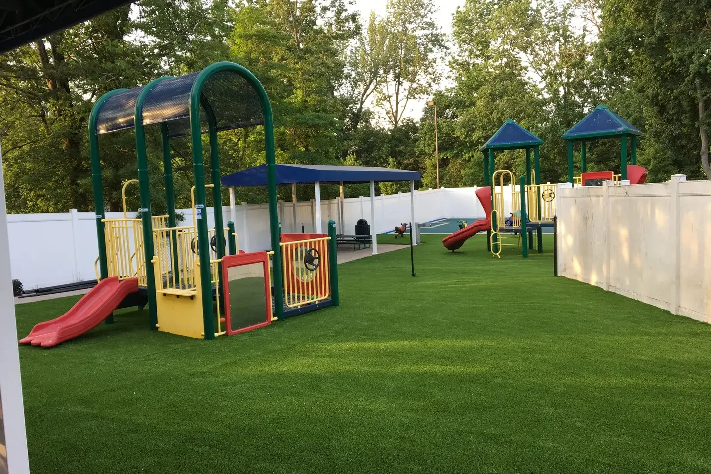 A playground with many different types of play equipment.